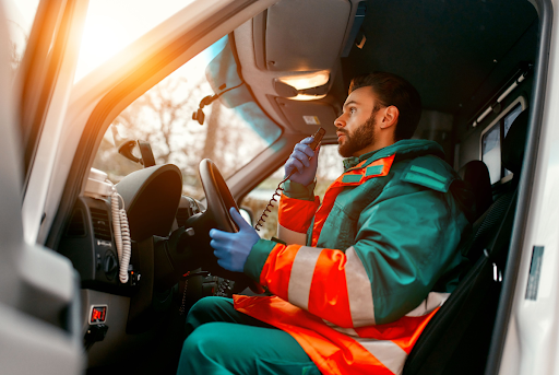 Emergency responder talking into an intercom