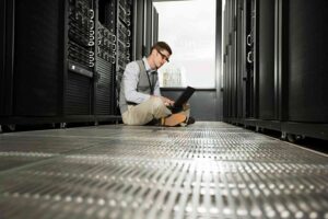 Network infrastructure audit by technician in New Jersey data center